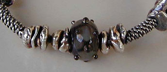 Lampwork Bead by Bernadette Fuentes with Hill Tribe Silver bangle bracelet - by Vicky Jousan